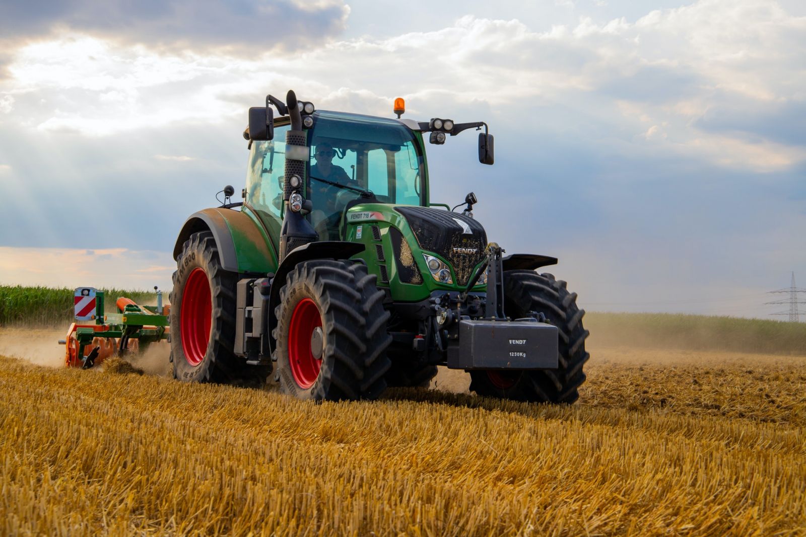 A tractor in the middle of the field